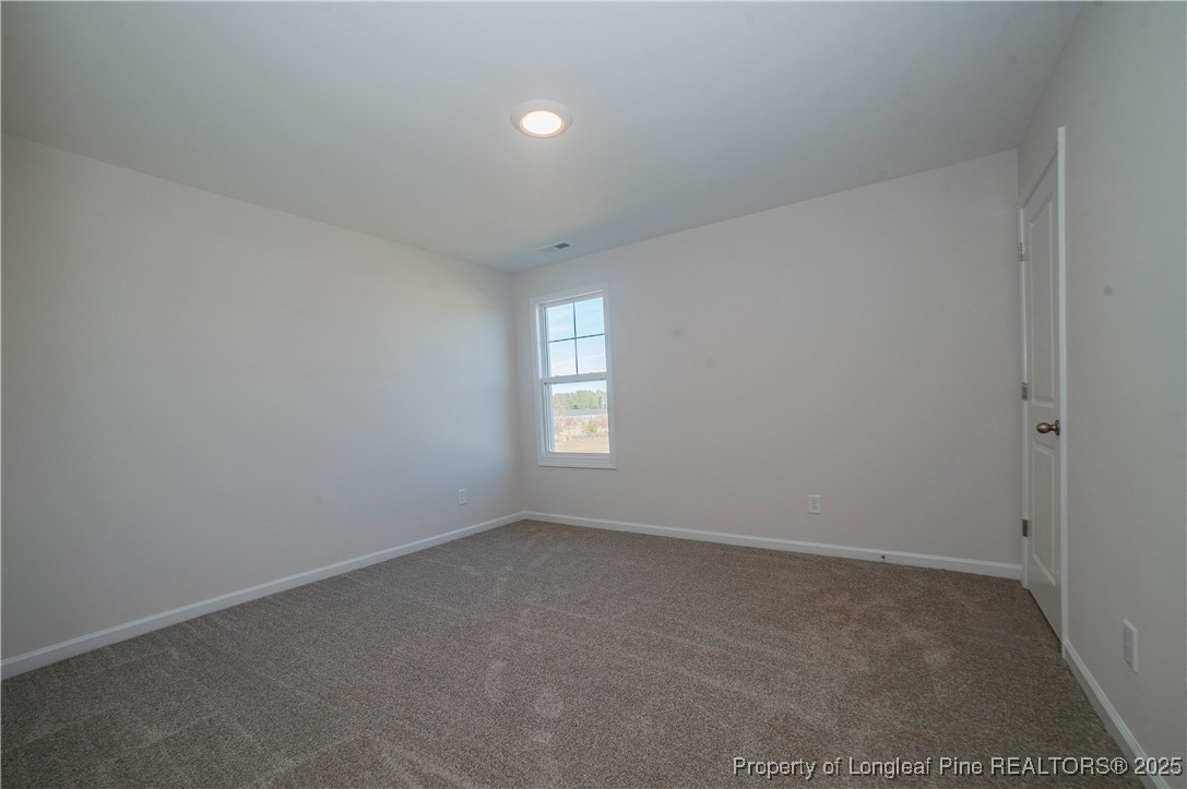 164 Ziggy Way Raeford, NC 28376 - Photo 20 of 25 an empty room with a window