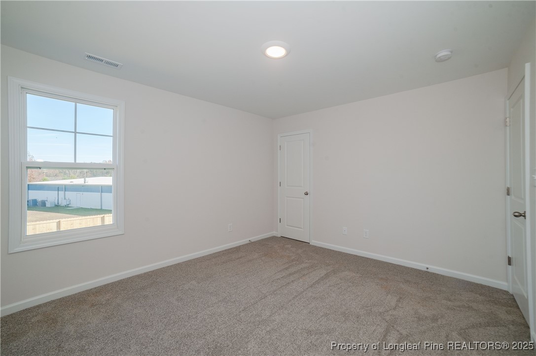 164 Ziggy Way Raeford, NC 28376 - Photo 23 of 25 an empty room with a window