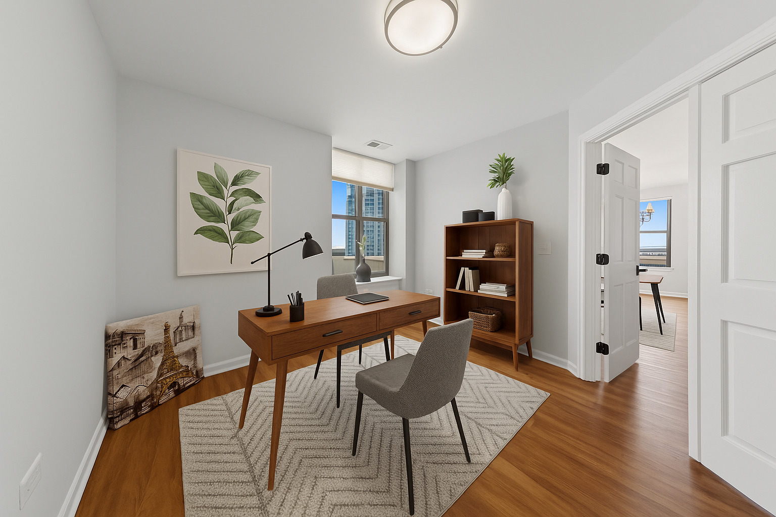 1250 South Indiana Avenue, Unit 1301 Chicago, IL 60605 - Photo 4 of 5 a view of a dining room with furniture and wooden floor
