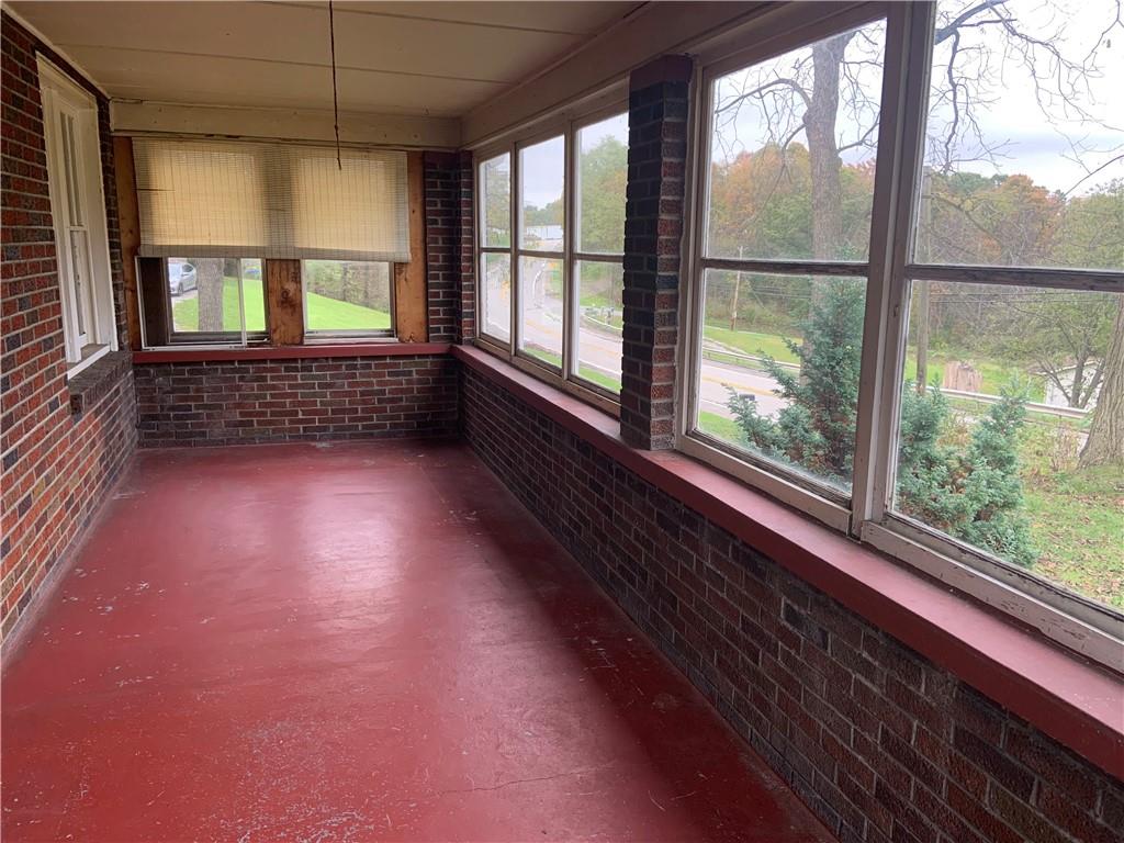 383 Chicora Road Butler, PA 16001 - Photo 3 of 24 wooden floor in an empty room with a window