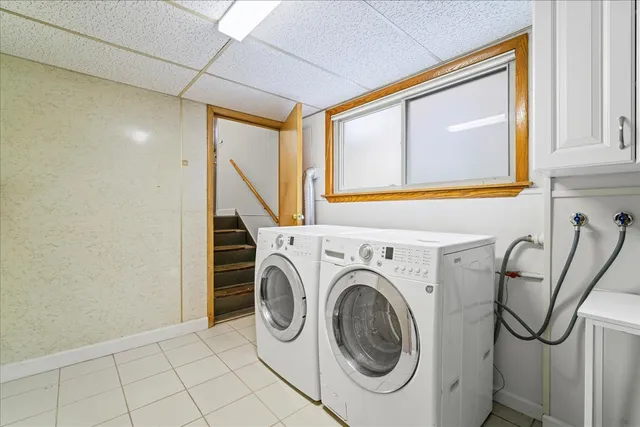 a view of a storage & utility room with washer and dryer