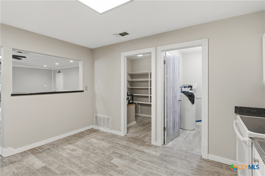 332 West Klein Street Seguin, TX 78155 - Photo 13 of 24 wooden floor in an empty room