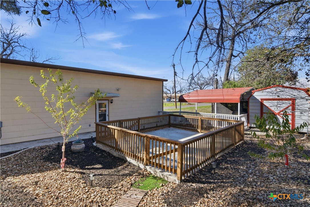332 West Klein Street Seguin, TX 78155 - Photo 22 of 24 a view of a backyard with a patio