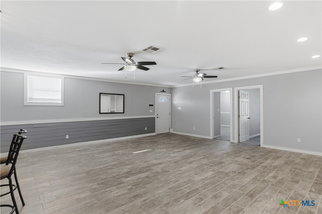 332 West Klein Street Seguin, TX 78155 - Photo 4 of 24 a view of an empty room with a window