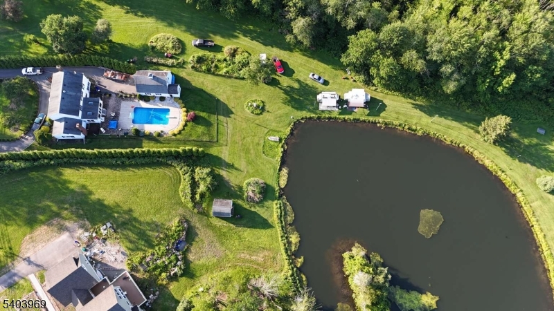 290 Powerville Road Boonton, NJ 07005 - Photo 13 of 20 an aerial view of a house with a garden and lake view
