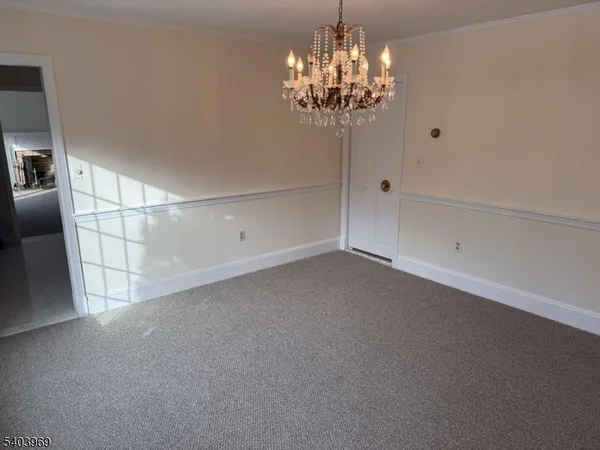 a view of a chandelier in big room