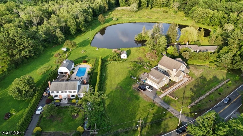 290 Powerville Road Boonton, NJ 07005 - Photo 9 of 20 an aerial view of a house with a yard and trees