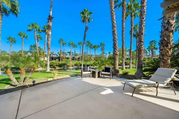 a view of a car park in front of house