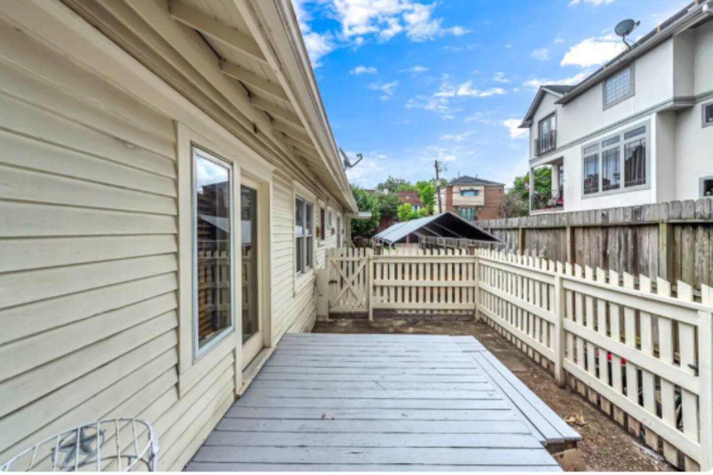 4204 Stanford Street Houston, TX 77006 - Photo 12 of 19 a view of a brick house with wooden fence