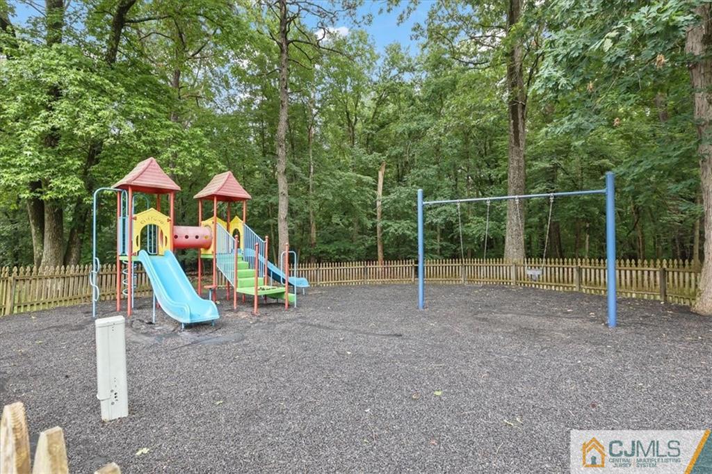809 Meadow Court, Unit 809 Helmetta, NJ 08828 - Photo 8 of 8 a view of a park with slide