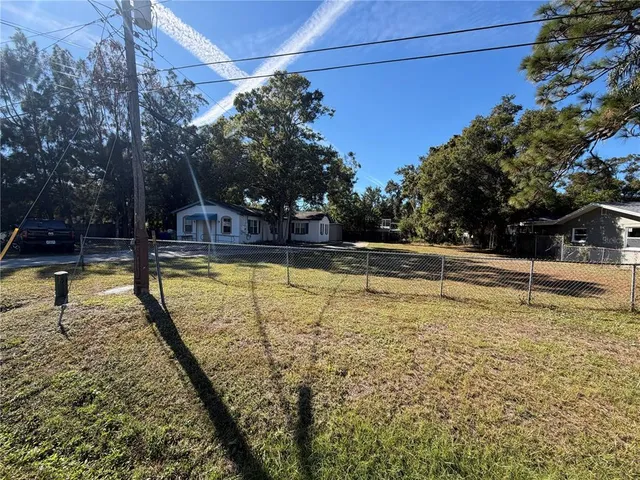 a view of a swimming pool with an outdoor space