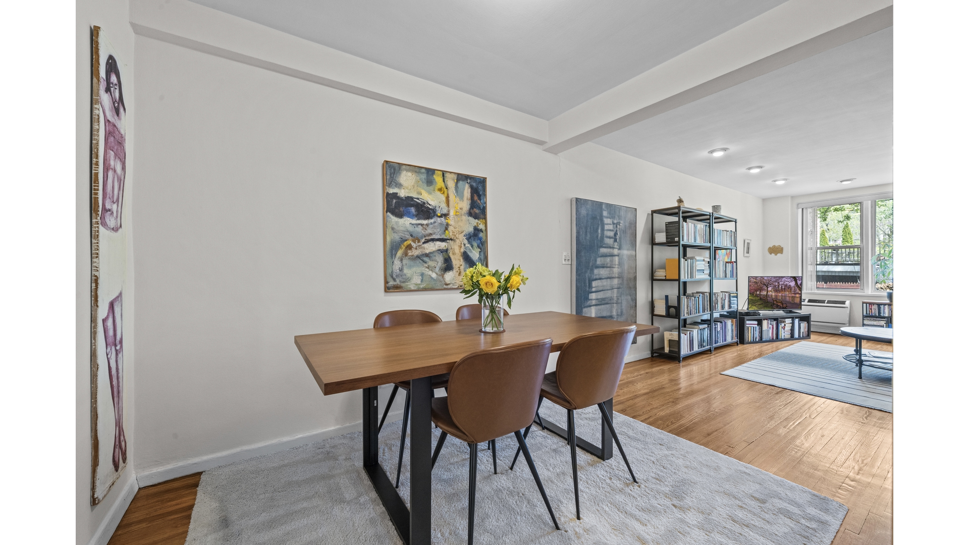 601 Kappock Street, Unit 2F Bronx, NY 10463 - Photo 3 of 15 a view of a dining room with furniture and wooden floor