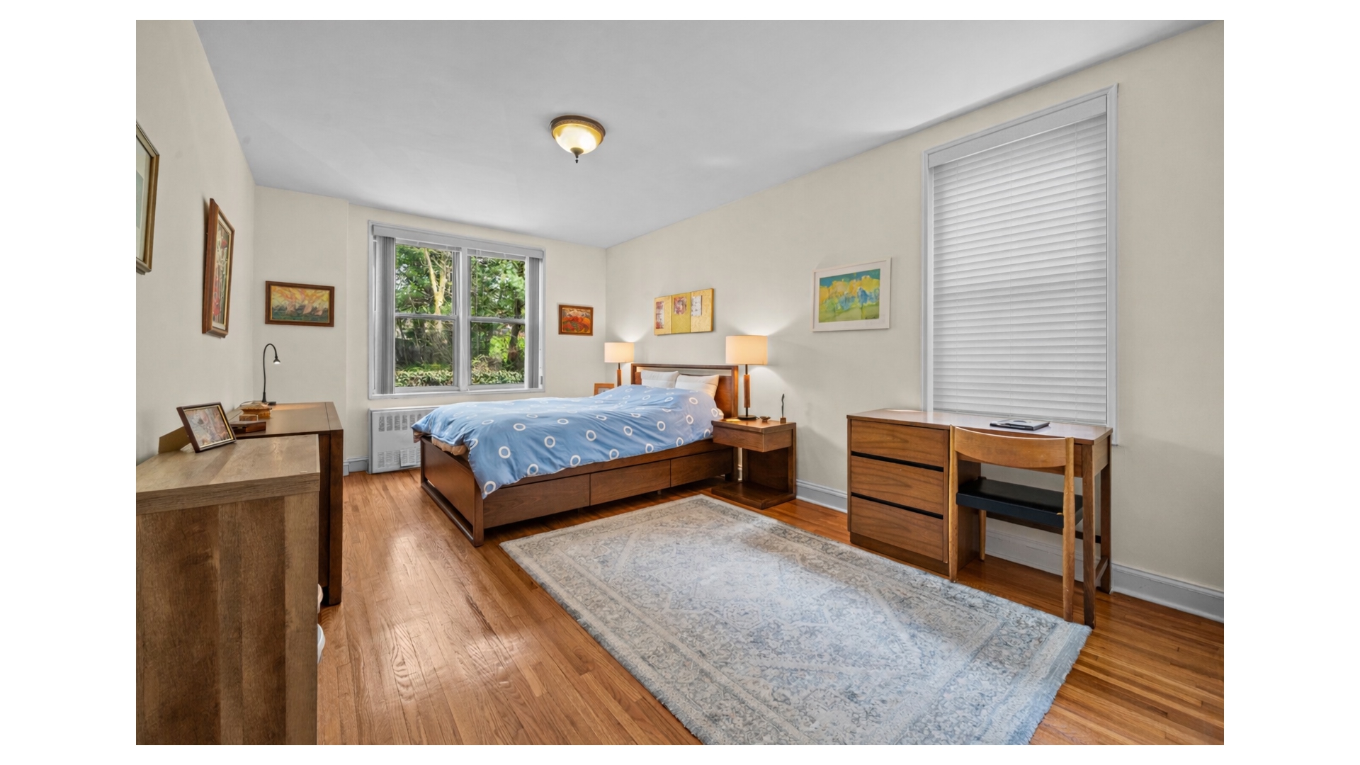 601 Kappock Street, Unit 2F Bronx, NY 10463 - Photo 8 of 15 a bedroom with a bed and a dresser next to a window