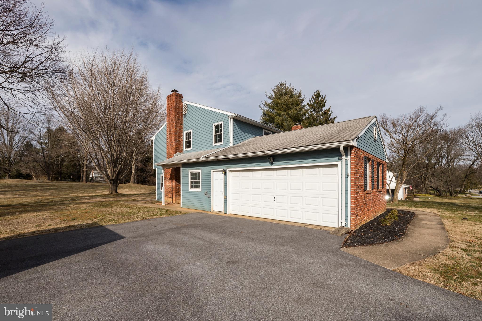 11 Moores Road Malvern, PA 19355 - Photo 28 of 39 Garage entrance form driveway