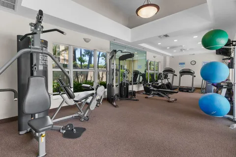 a view of a room with gym equipment