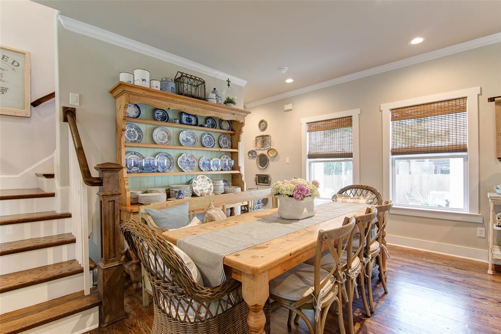 1309 Howell Street McKinney, TX 75069 - Photo 11 of 32 a view of a dining room with furniture and wooden floor