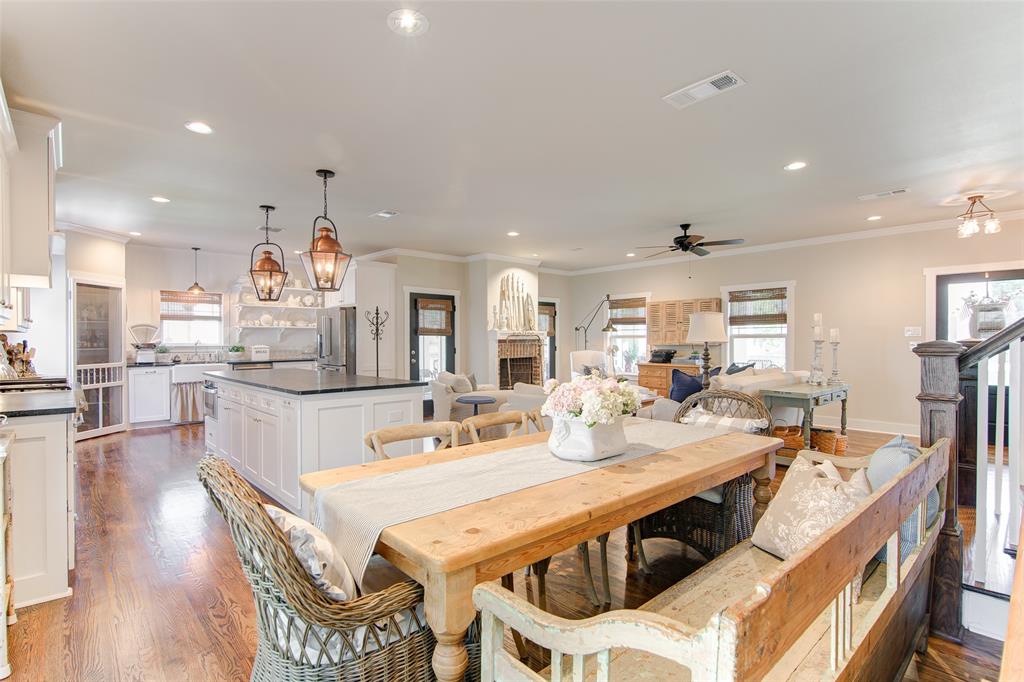 1309 Howell Street McKinney, TX 75069 - Photo 12 of 32 a large kitchen with a table and chairs