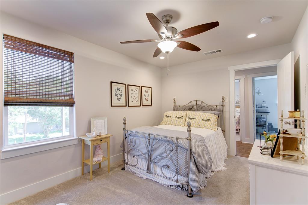 1309 Howell Street McKinney, TX 75069 - Photo 17 of 32 a bedroom with a bed and a large window