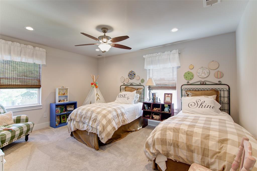 1309 Howell Street McKinney, TX 75069 - Photo 18 of 32 a bedroom with two beds and a large window