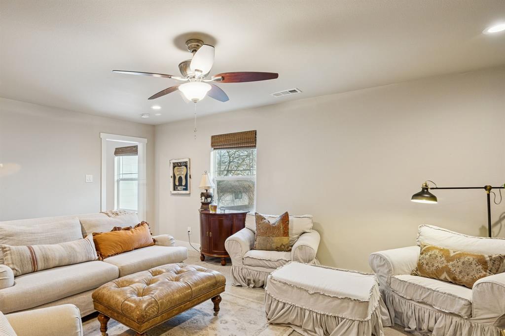 1309 Howell Street McKinney, TX 75069 - Photo 23 of 32 a living room with furniture and a window