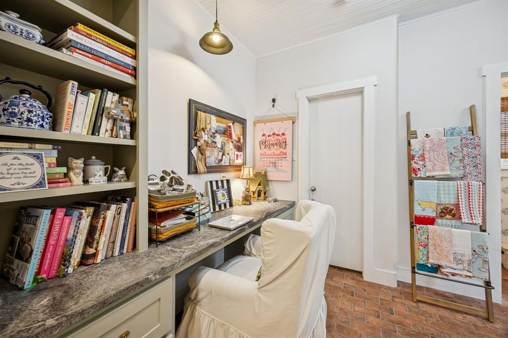 1309 Howell Street McKinney, TX 75069 - Photo 25 of 32 a view of a workspace with furniture and toys