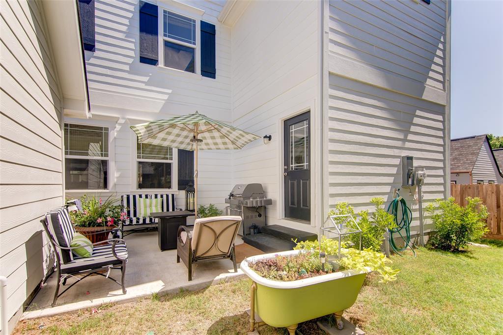 1309 Howell Street McKinney, TX 75069 - Photo 30 of 32 a view of a patio with table and chairs and potted plants