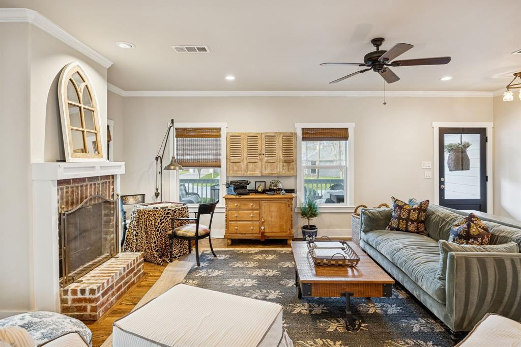 1309 Howell Street McKinney, TX 75069 - Photo 9 of 32 a living room with furniture and a large window