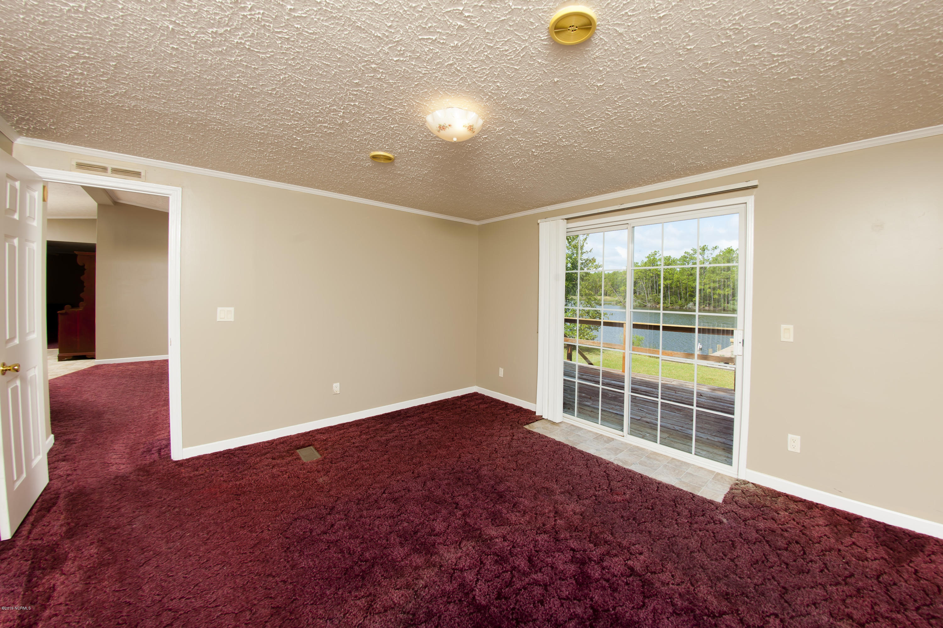 23 Croaker Road Merritt, NC 28556 - Photo 7 of 42 Master Bedroom
