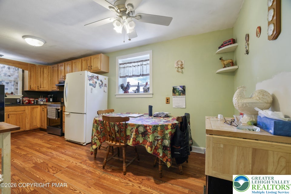 1207 Seese Hill Road Canadensis, PA 18325 - Photo 12 of 49 Warm wood cabinetry and rich plank flooring define this comfortable culinary space.