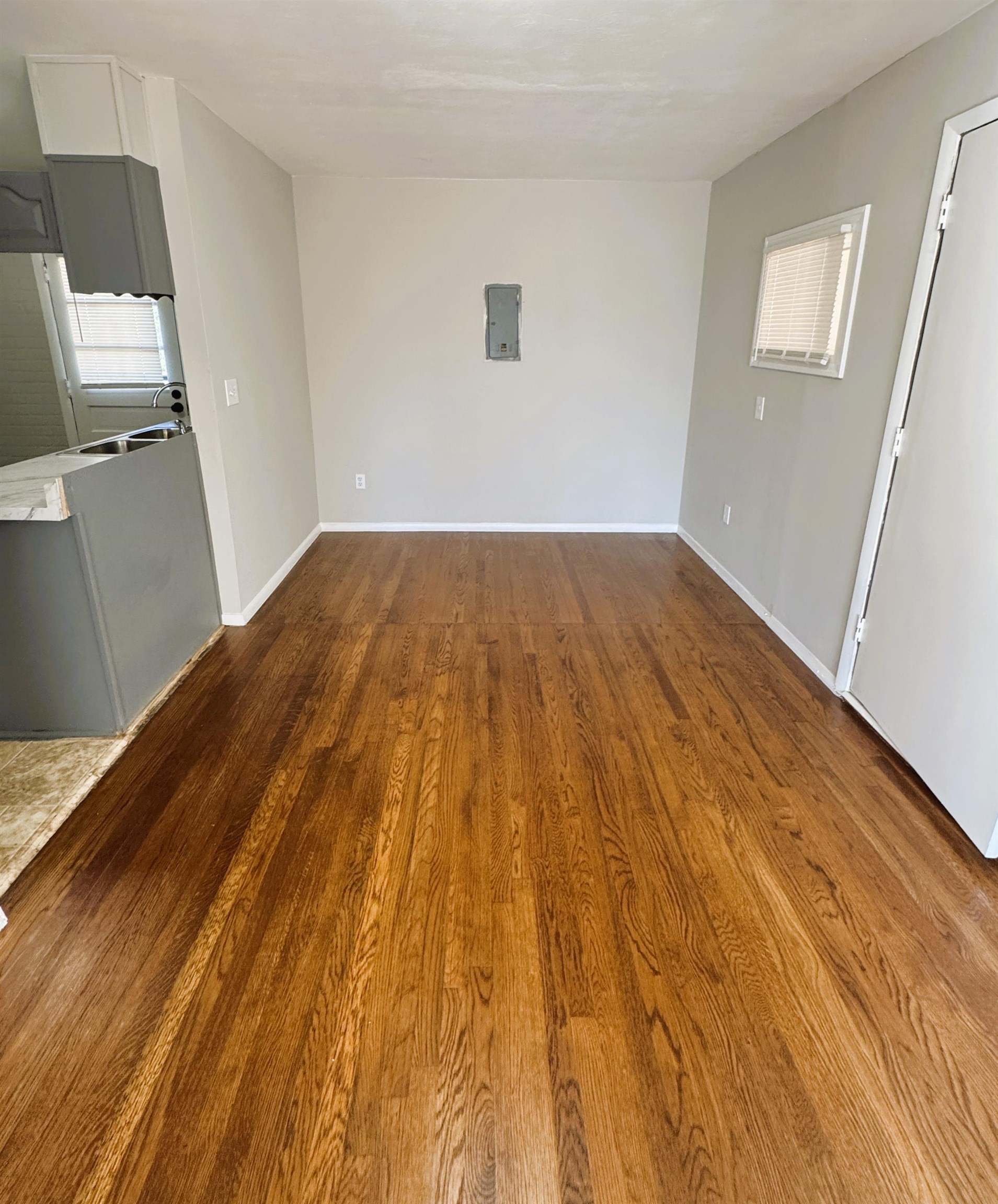 4956 Owen Road Memphis, TN 38122 - Photo 5 of 14 Unfurnished room featuring dark wood-type flooring and electric panel