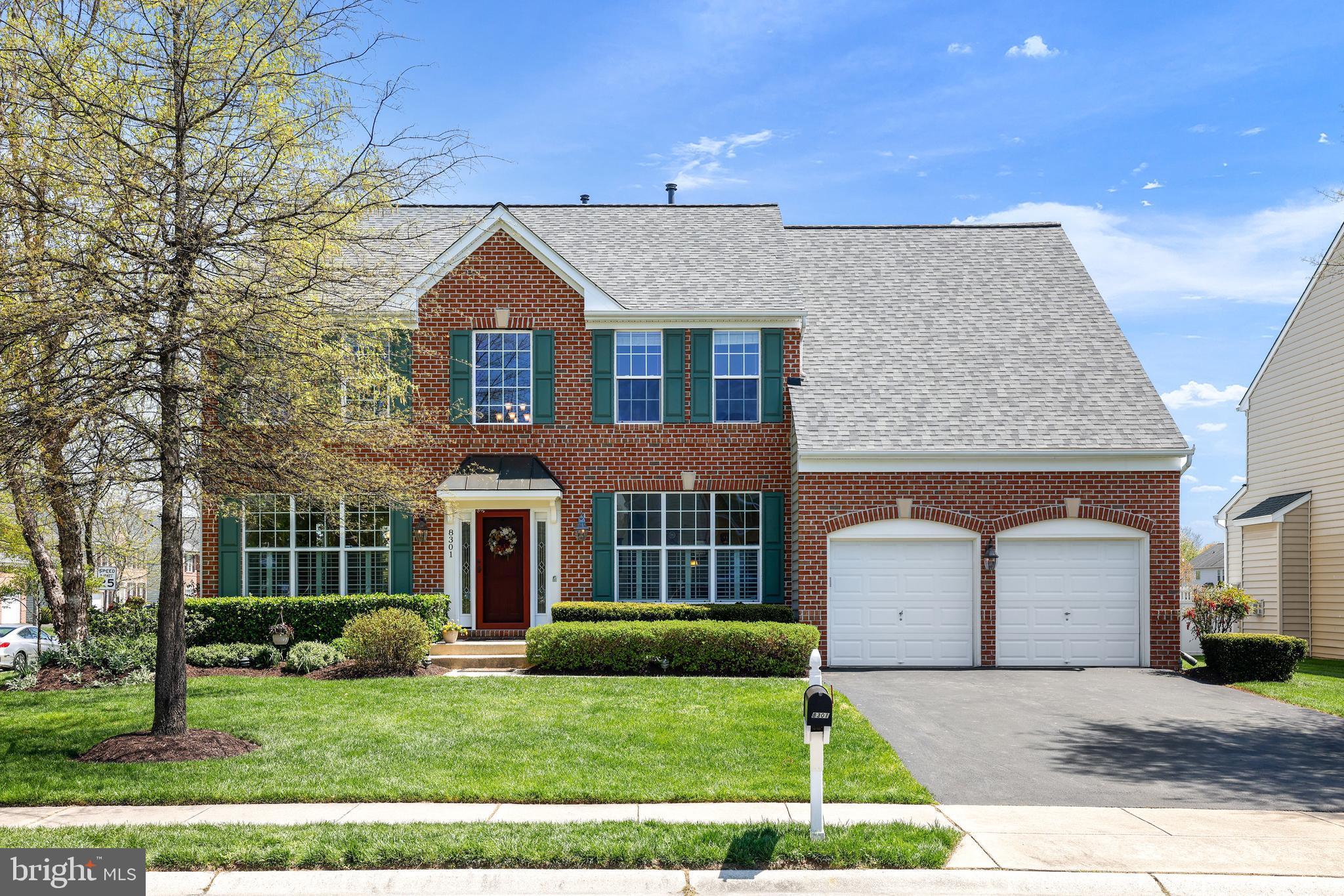 8301 Banister Road Severn, MD 21144 - Photo 1 of 57 a front view of a house with a yard