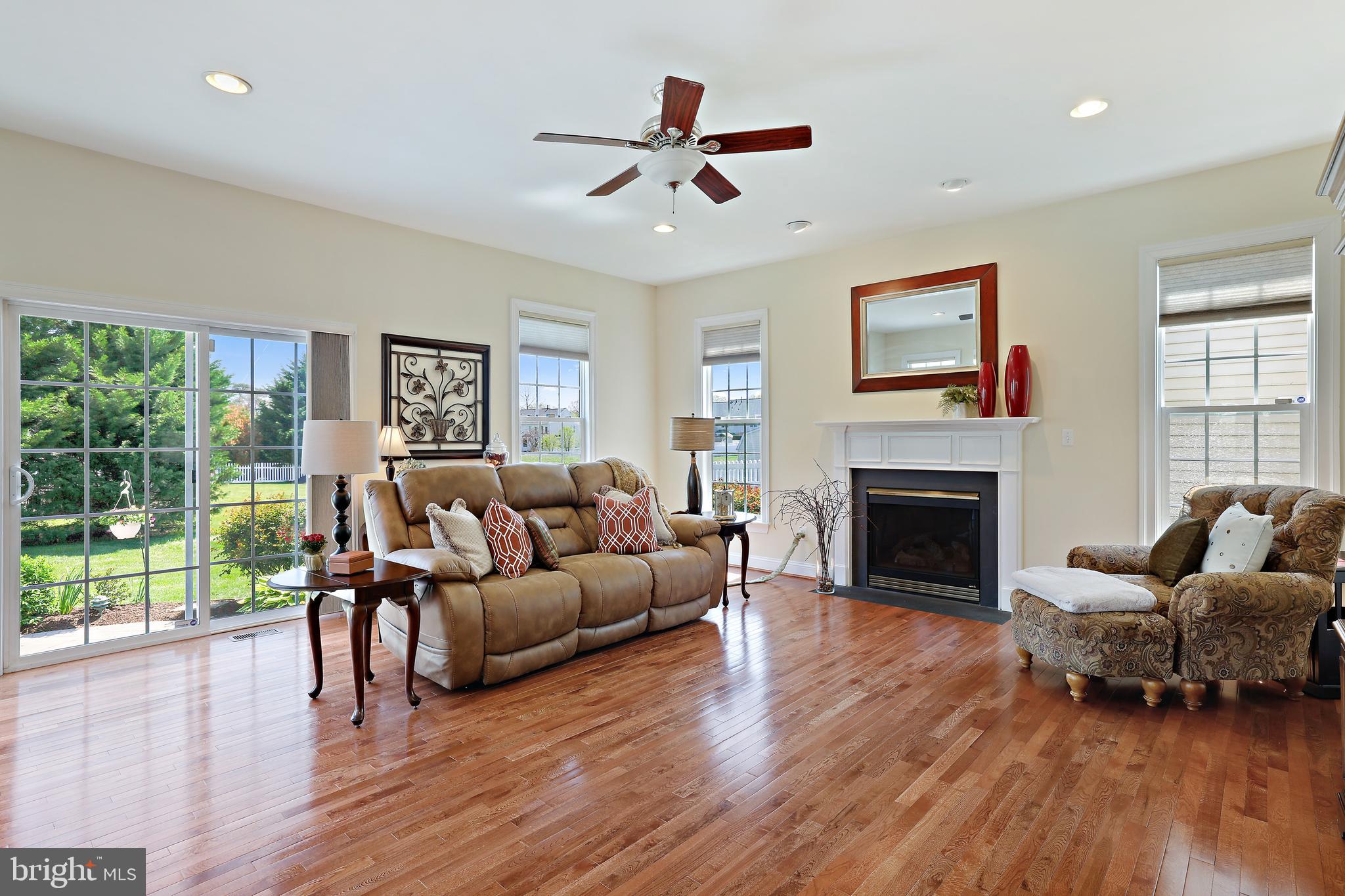 8301 Banister Road Severn, MD 21144 - Photo 2 of 57 a living room with furniture and a fireplace