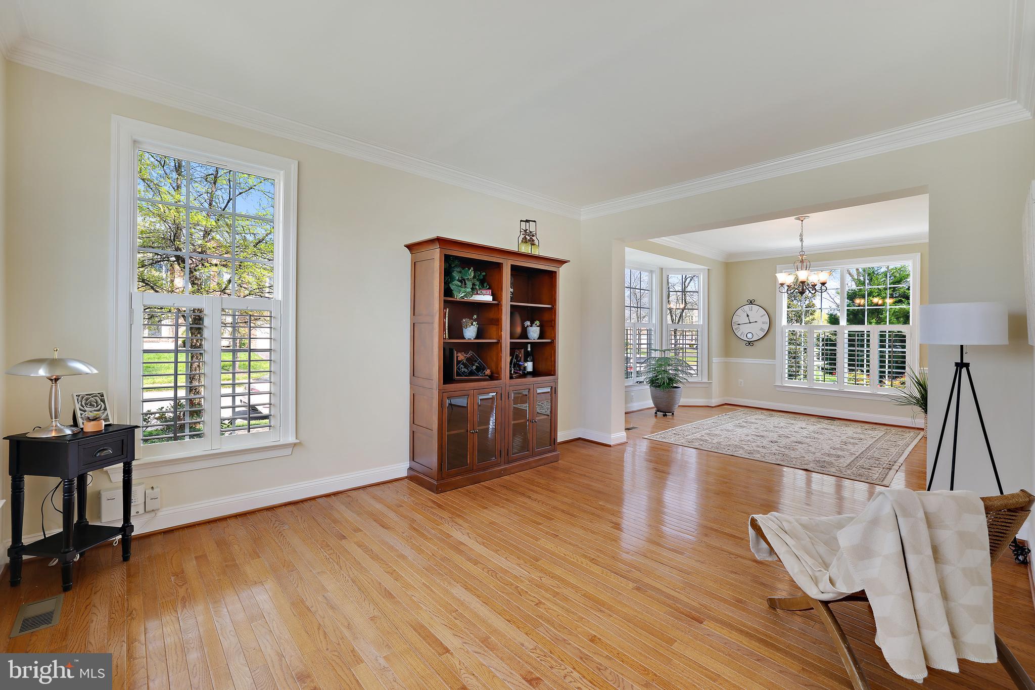 8301 Banister Road Severn, MD 21144 - Photo 15 of 57 a living room with furniture and a wooden floor