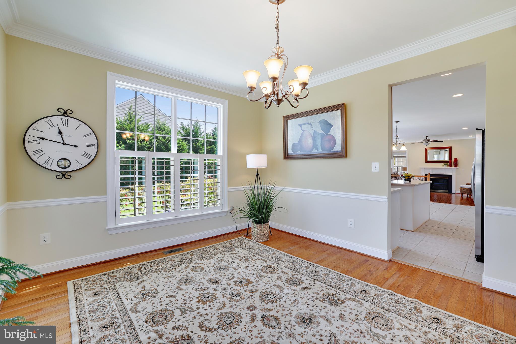8301 Banister Road Severn, MD 21144 - Photo 18 of 57 a view of a livingroom with furniture window and wooden floor