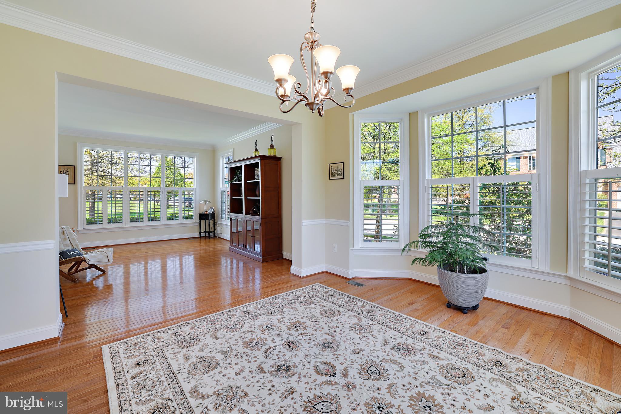 8301 Banister Road Severn, MD 21144 - Photo 3 of 57 a view of a living room and a window with wooden floor