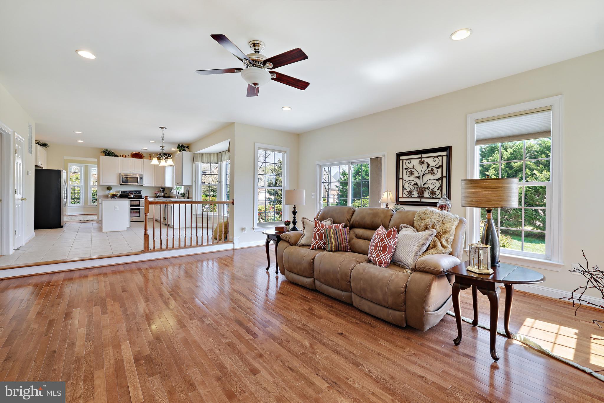 8301 Banister Road Severn, MD 21144 - Photo 25 of 57 a living room with furniture and a wooden floor