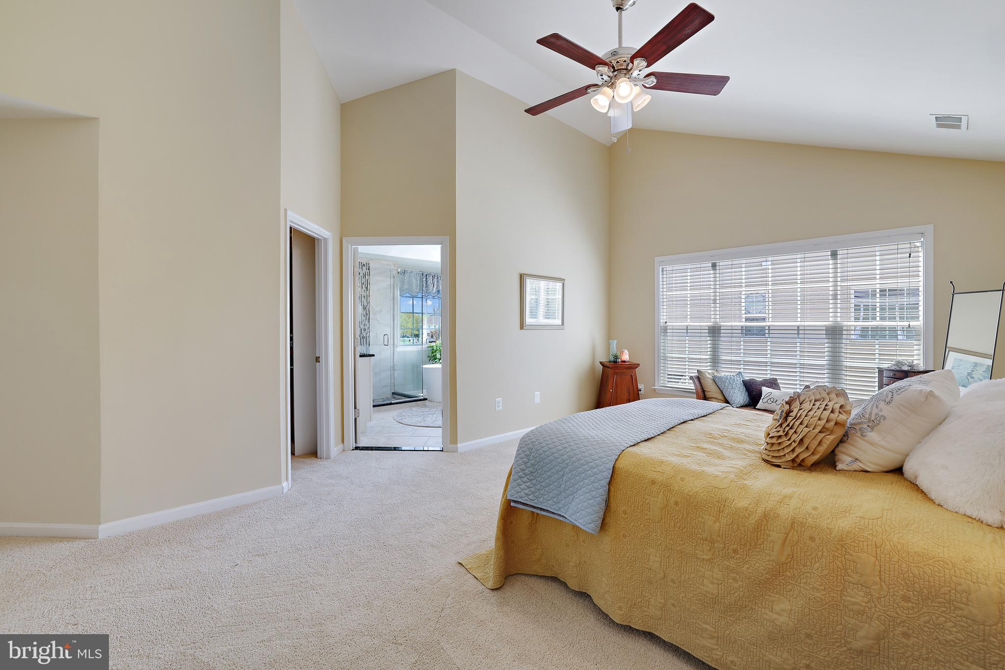 8301 Banister Road Severn, MD 21144 - Photo 33 of 57 a bedroom with a bed and a large window