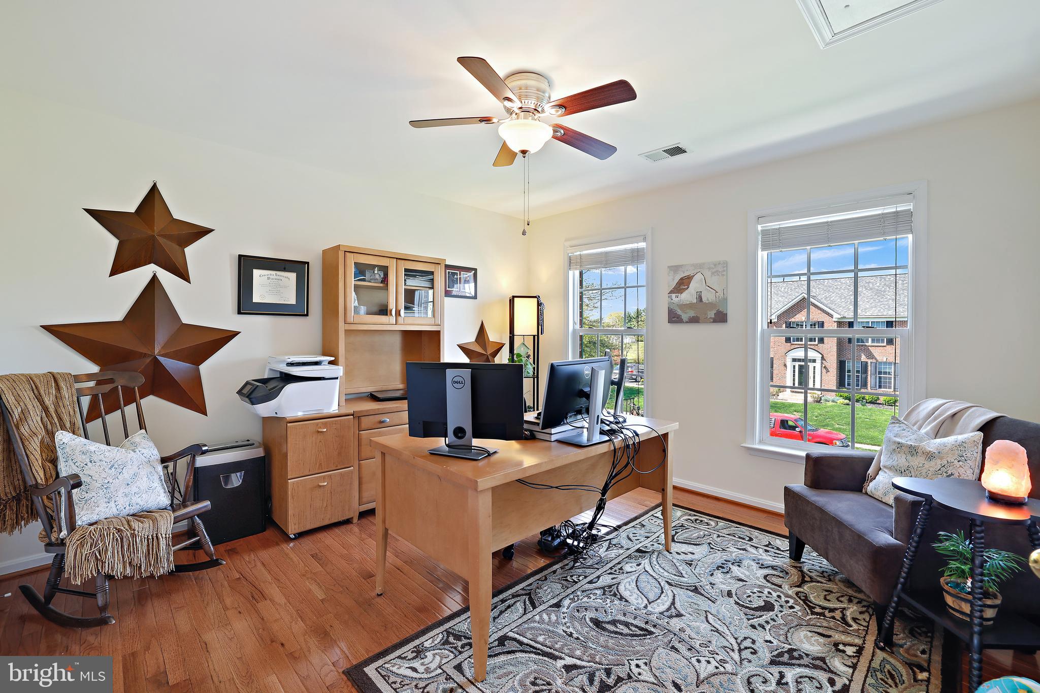 8301 Banister Road Severn, MD 21144 - Photo 38 of 57 a work room with furniture and a ceiling fan