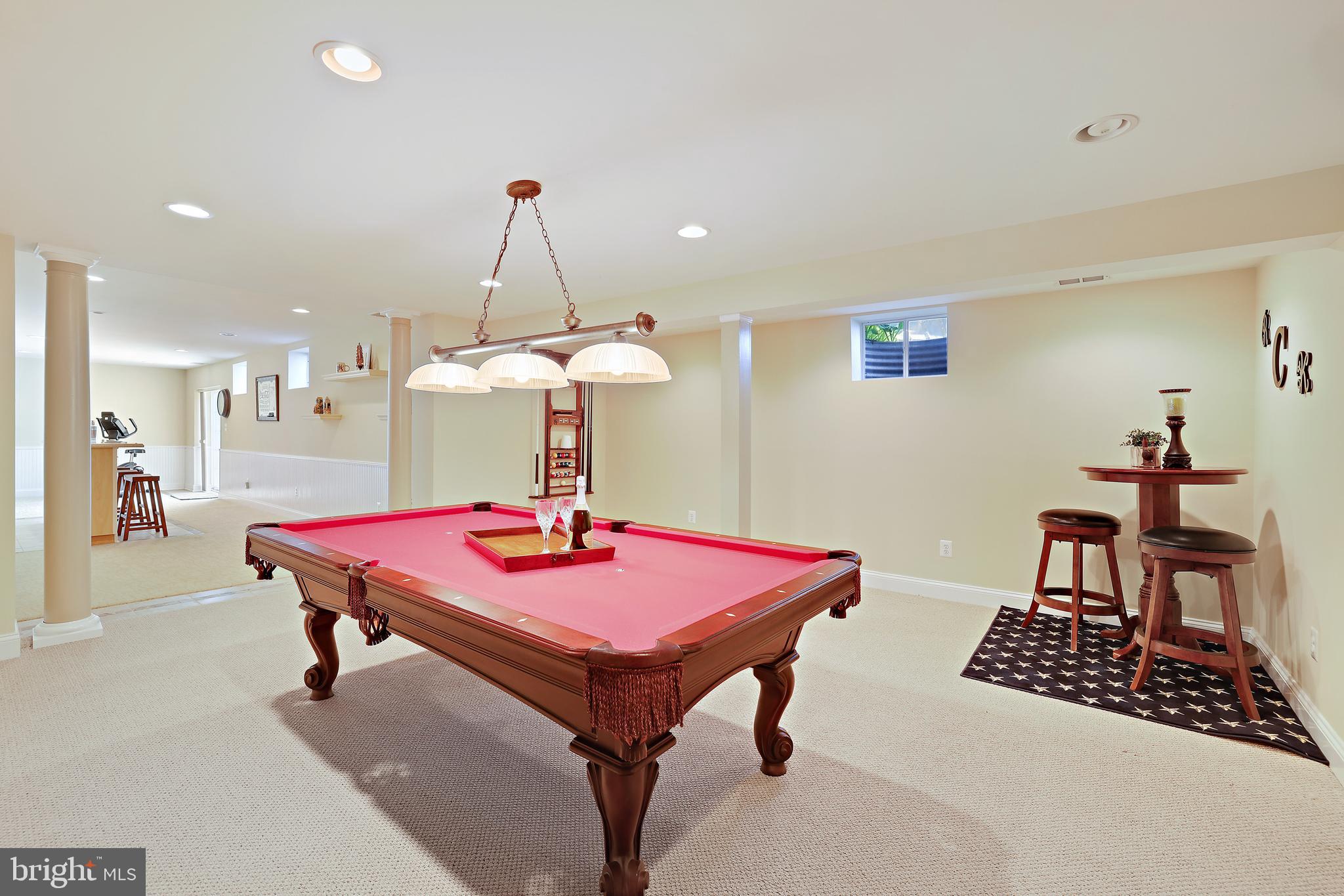 8301 Banister Road Severn, MD 21144 - Photo 51 of 57 a dining room with furniture and chandelier