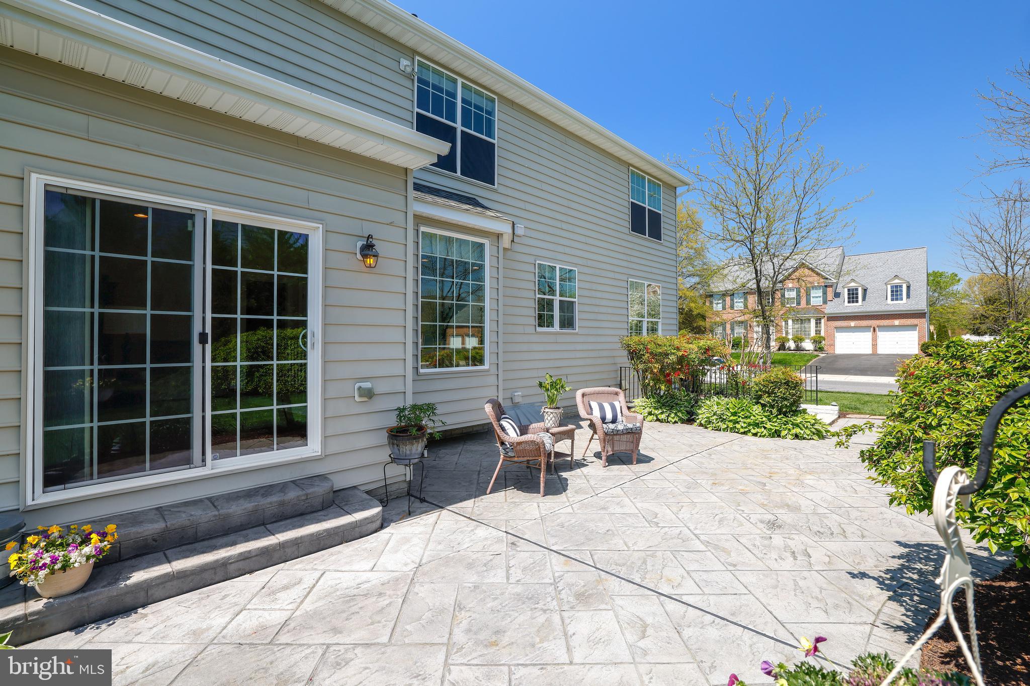8301 Banister Road Severn, MD 21144 - Photo 54 of 57 a backyard of a house with outdoor seating