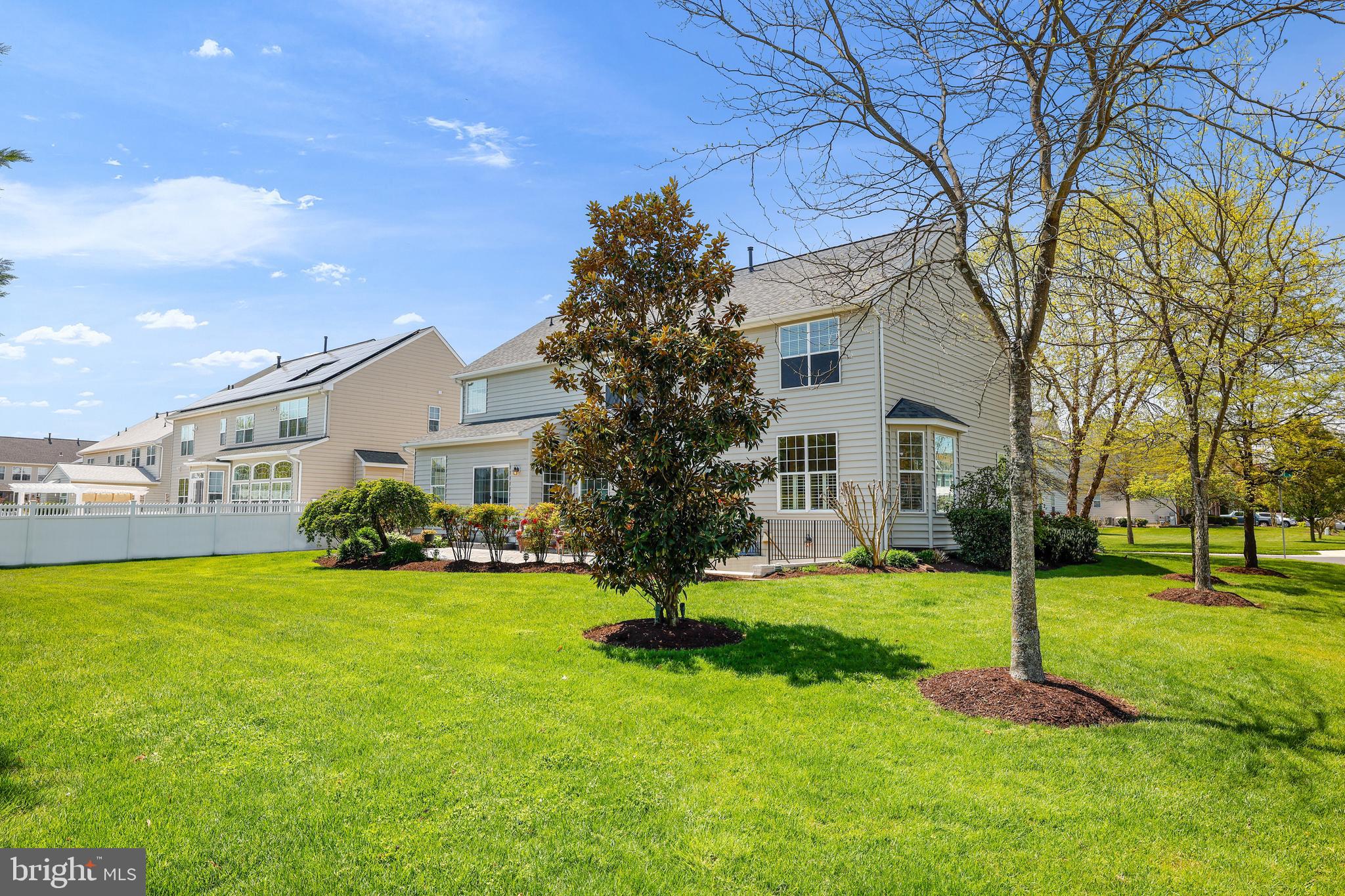8301 Banister Road Severn, MD 21144 - Photo 55 of 57 a view of a house with a yard