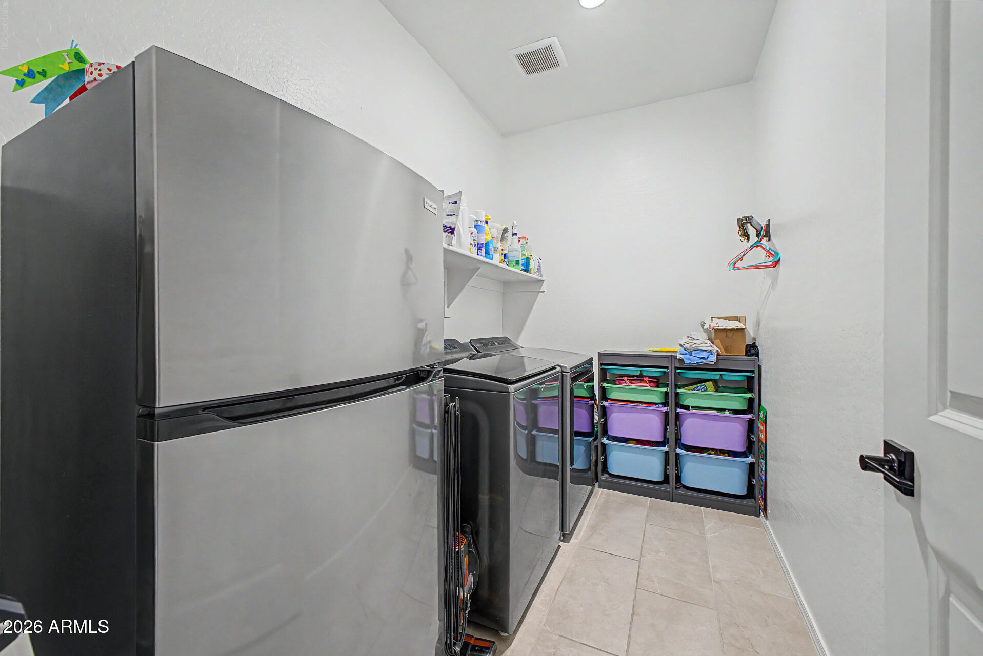 2540 West Grenadine Road Phoenix, AZ 85041 - Photo 40 of 69 Large Laundry Room