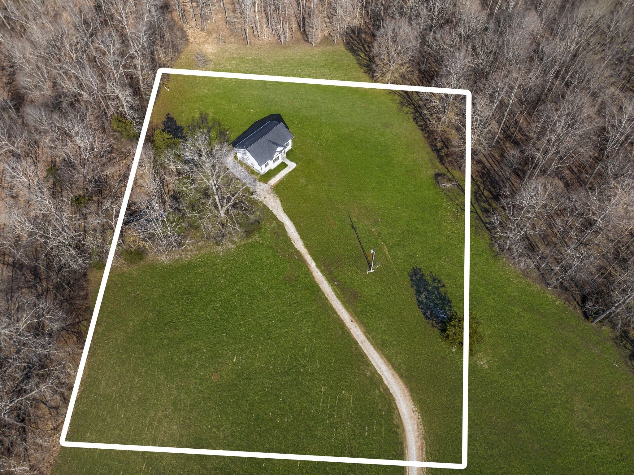1069 Old County House Road Charlotte, TN 37036 - Photo 33 of 43 AERIAL DRONE Photos w/ Approximate Lines by Photographer *Rely on actual survey only for exact property lines Note: Green grass edits on exterior photos