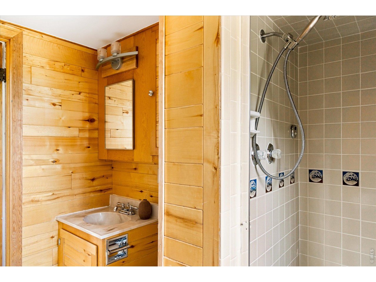 187 Nugget Hill Road Jamestown, CO 80455 - Photo 17 of 34 a bathroom with a shower and a sink