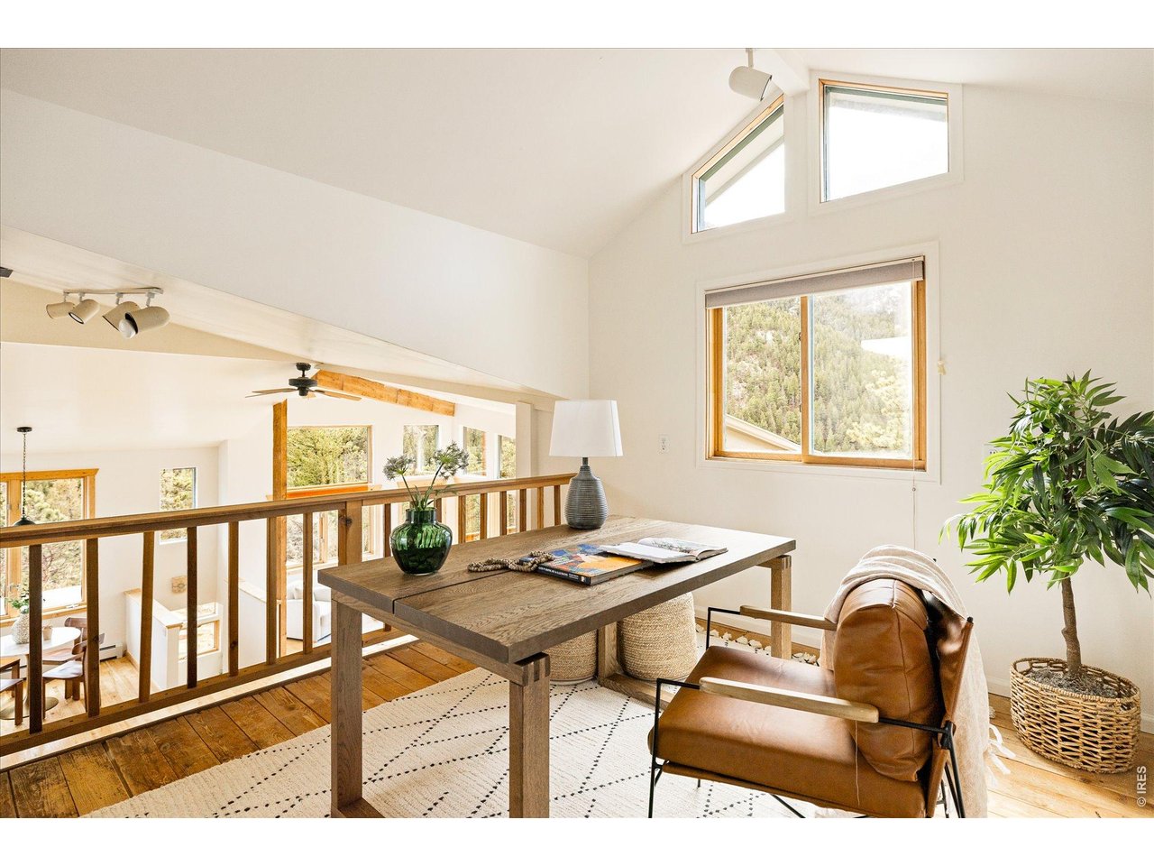 187 Nugget Hill Road Jamestown, CO 80455 - Photo 21 of 34 a balcony with table and chairs