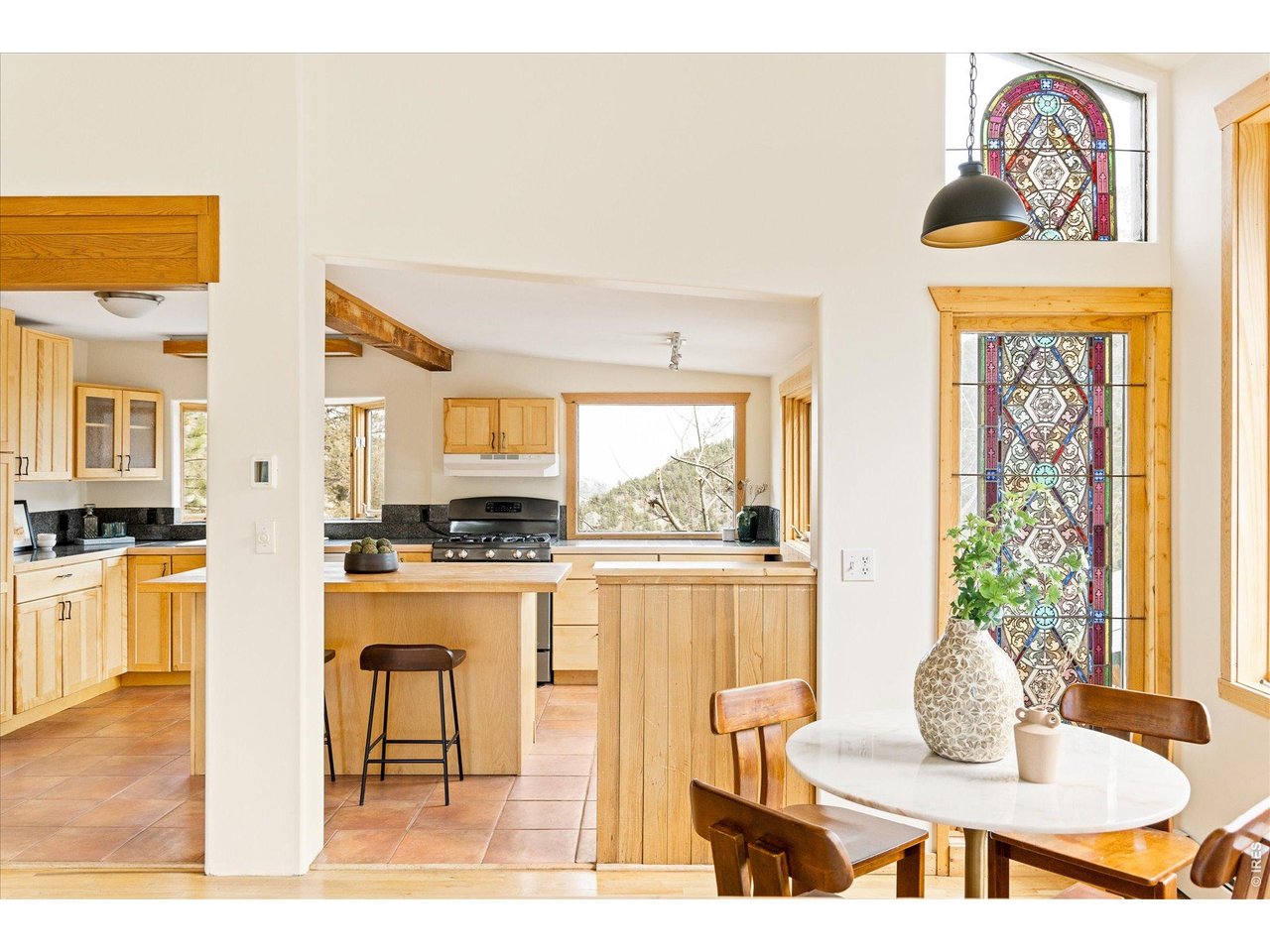 187 Nugget Hill Road Jamestown, CO 80455 - Photo 34 of 34 a living room with stainless steel appliances kitchen island granite countertop furniture and a kitchen view