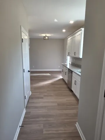 a bathroom with a sink a mirror and a toilet