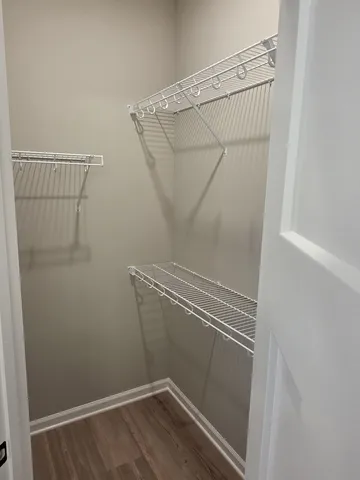 a view of a room with racks on the wall