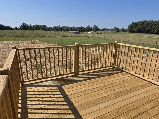 a view of a balcony with lake