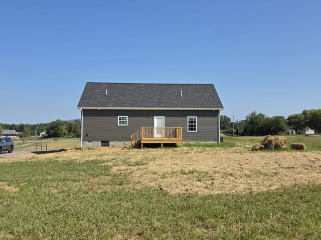 a house with trees in the background
